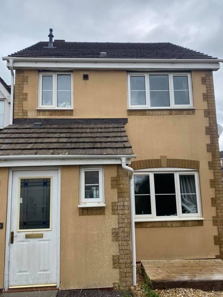 Clean residential render after soft washing